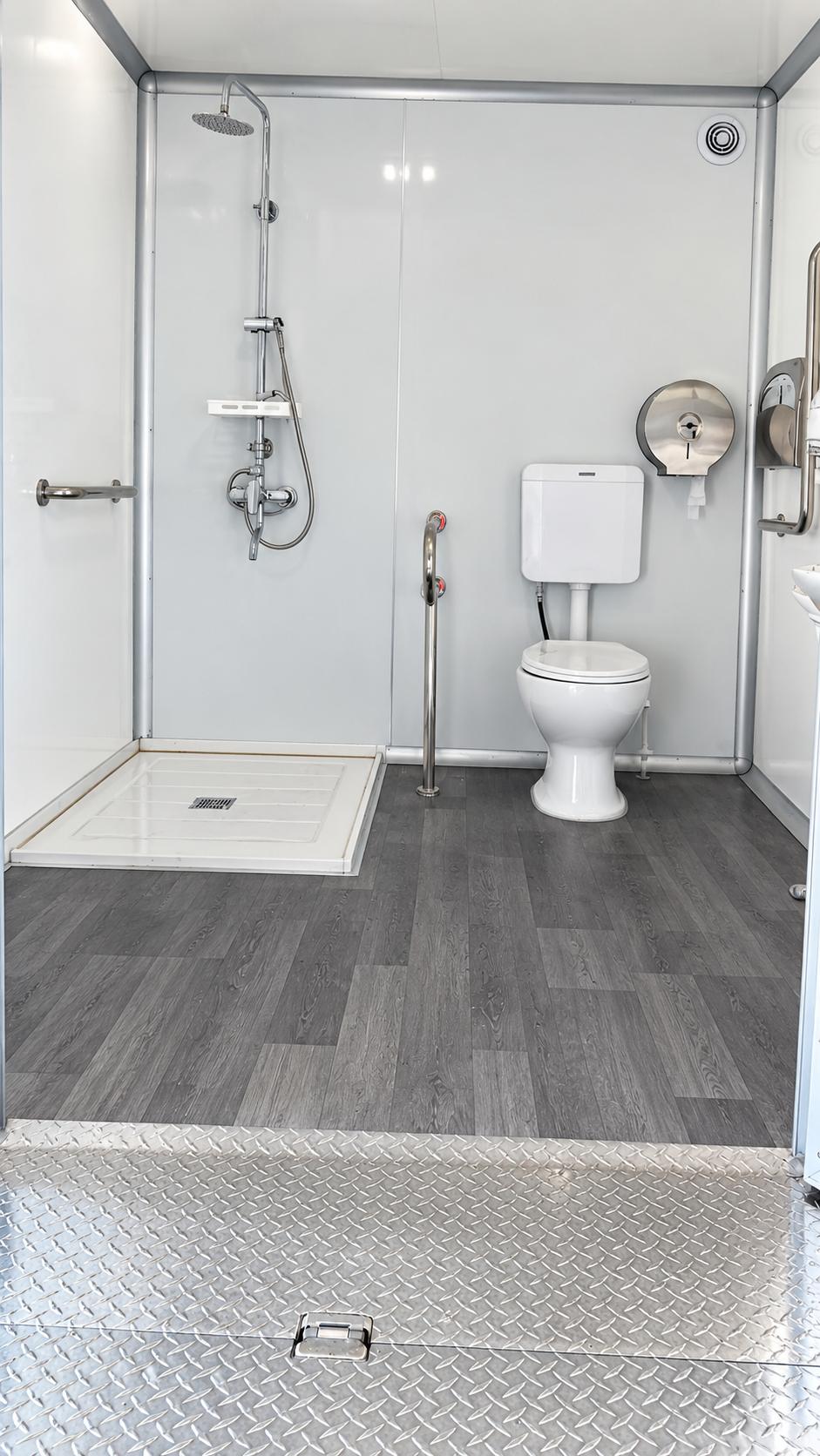 Commercial shower restroom trailer with toilet interior