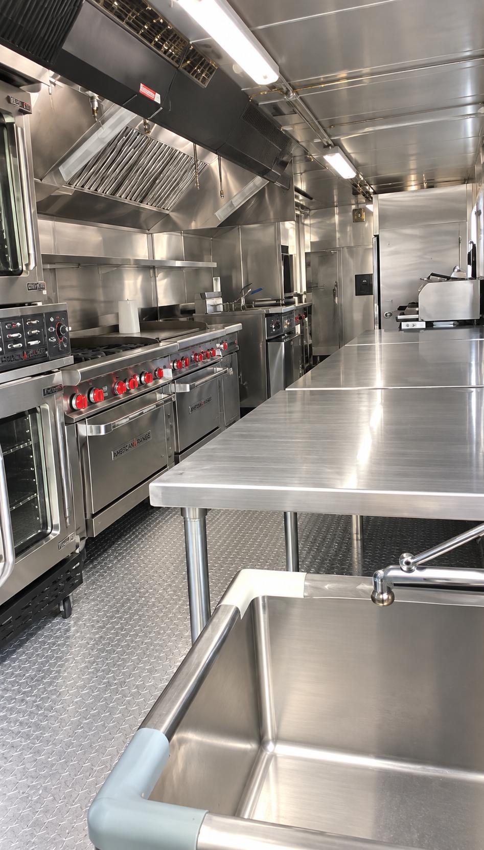 Temporary commercial kitchen trailer cooking prep area