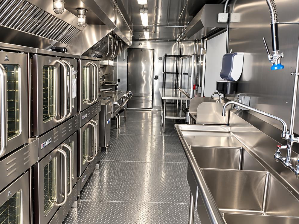 Mobile commercial kitchen trailer ovens wash station prep area